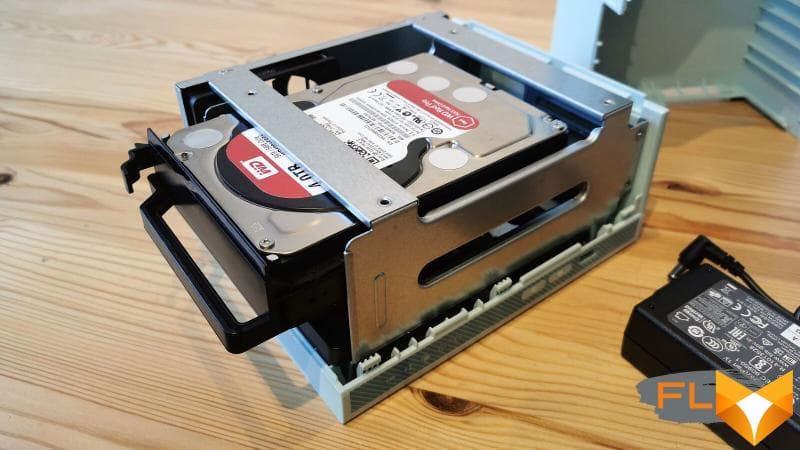The TS-230 comes apart easily to install drives